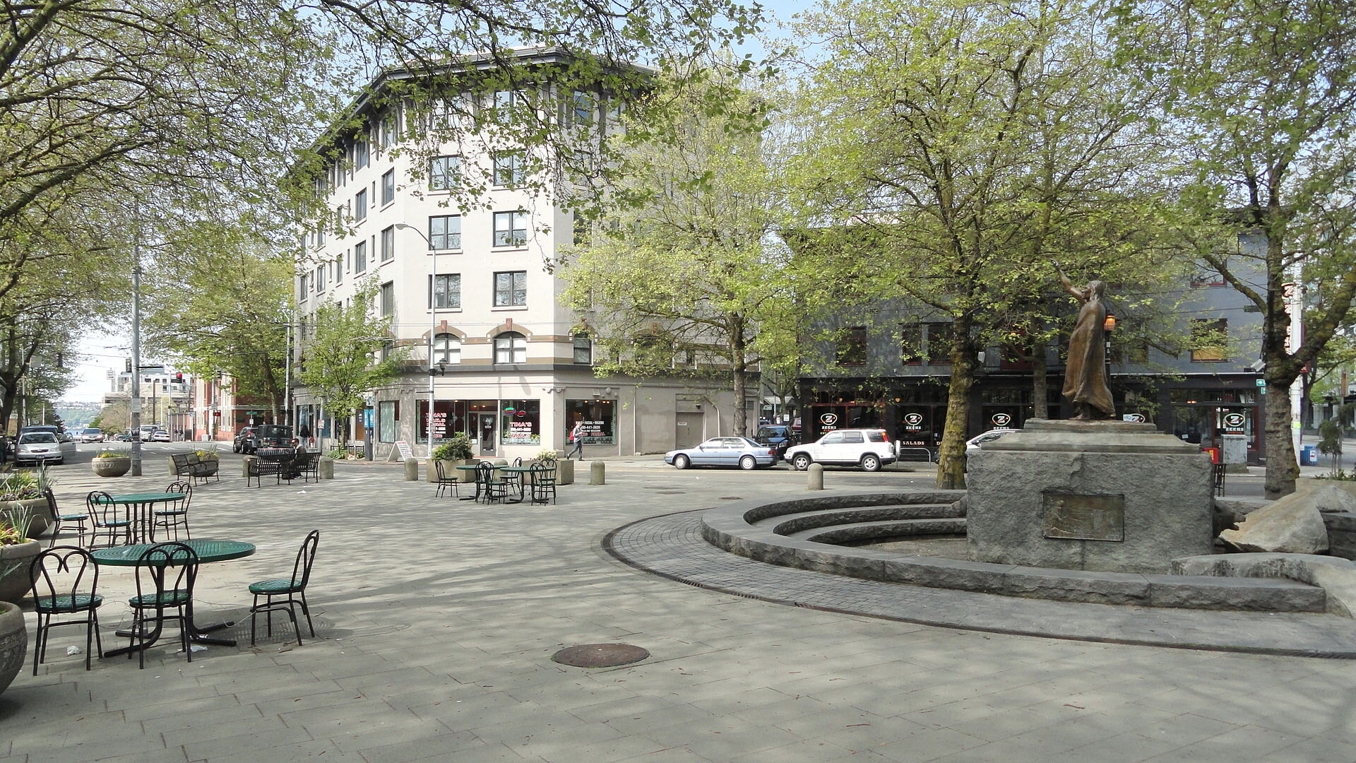   Statue  of  Chief Seattle  overlooking Tilikum Place. Cedar Street is in the background. 