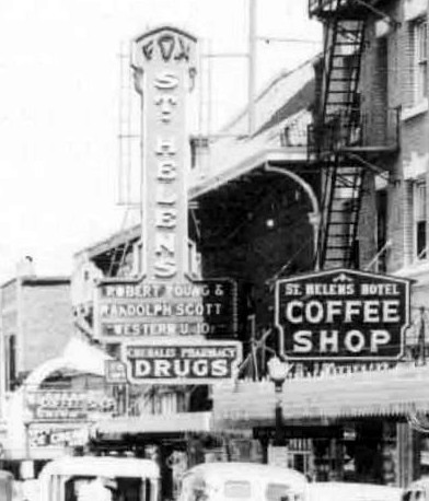 Fox's St. Helen's Theater picutred as the center of a crowded main street in Chehalis Washingotn during the 1940s